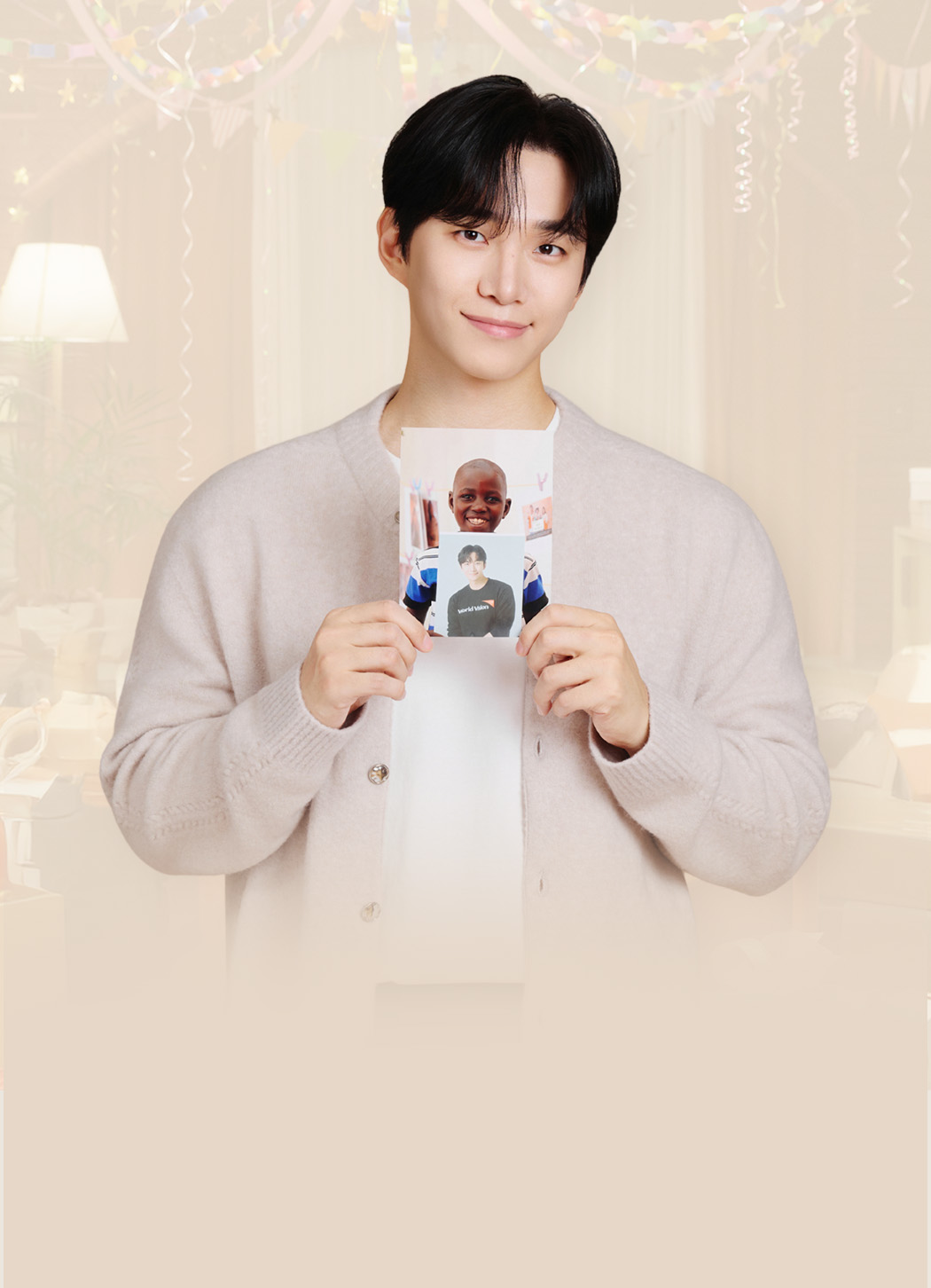 준호와 준호 사진을 들고 있는 아이